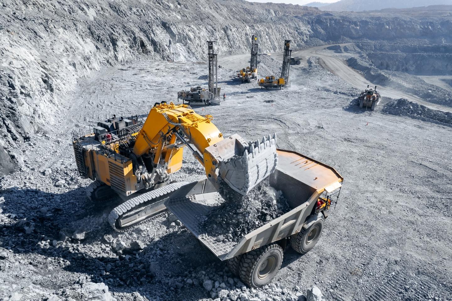Mining operation with excavator and haul truck
